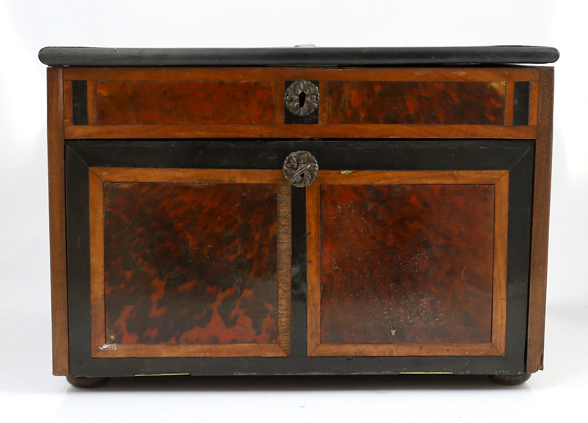 An early 18th century Indo Portuguese ebony, satinwood and red tortoiseshell travelling case, 42cm wide, 30cm deep, 29cm high. Ivory submission reference: YHDD1FSF